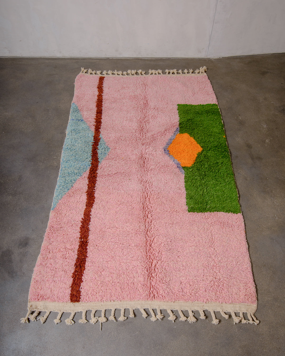 Modern, designer, handcrafted Berber rug from Morocco. Beniourain carpet with beautiful colours and patterns and fluffy wool texture.